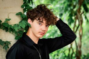 family photographer in rochester ny captures senior portraits for high school senior at the Eastman Museum