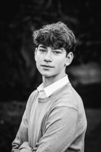 family photographer in rochester ny captures senior portraits for high school senior at the Eastman Museum