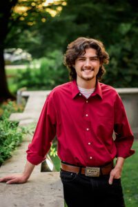 family photographer in rochester ny captures senior portraits for high school senior at the Eastman Museum