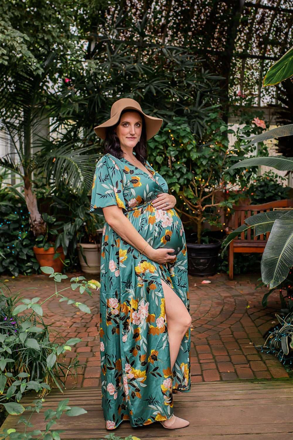 maternity photographer in rochester ny captures pregnany portraits of expectant mom in the lamberton conservatory