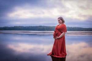 maternity photographer in rochester ny captures gorgeous expectant mother at sunset