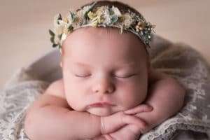 newborn photographer in rochester ny captures newborn baby girl sleeping