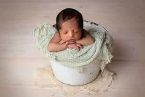 newborn photographer in rochester ny captures newborn baby boy