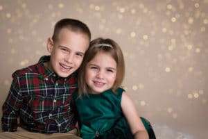 family photographer in rochester ny captures family christmas portraits during christmas mini sessions in her studio