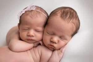 newborn photographer in rochester ny captures newborn twins sleeping
