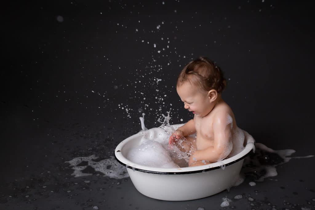 baby photographer in rochester ny captures first birthday cake smash photos