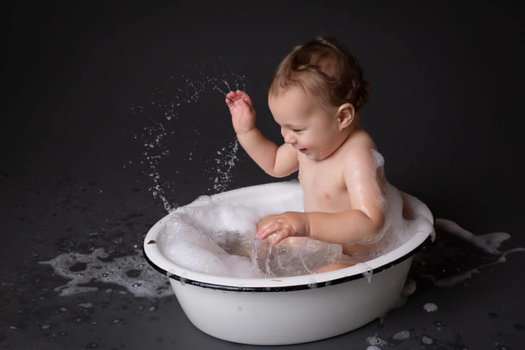 baby photographer in rochester ny captures first birthday cake smash photos