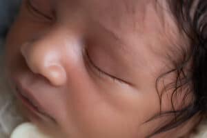 newborn photographer in rochester ny captures macros portraits of newborn baby boy's eye lashes