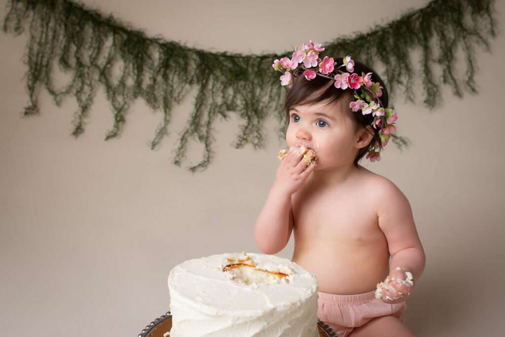 baby photographer in rochester ny captures bohemian cake smash to celebrate baby girl's first birthday