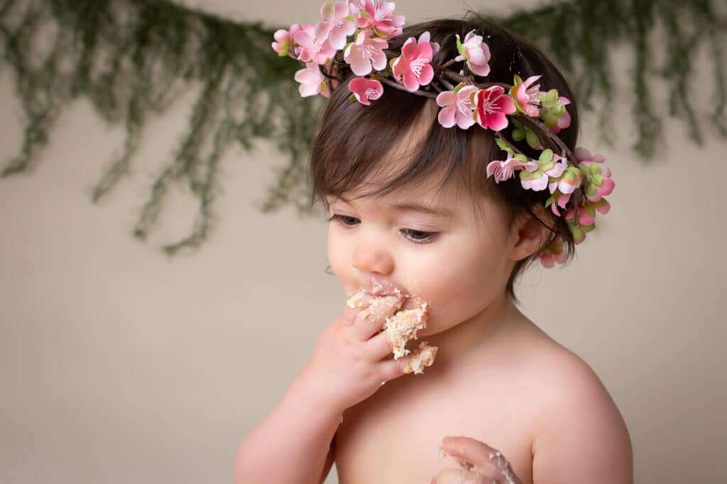 baby photographer in rochester ny captures bohemian cake smash to celebrate baby girl's first birthday