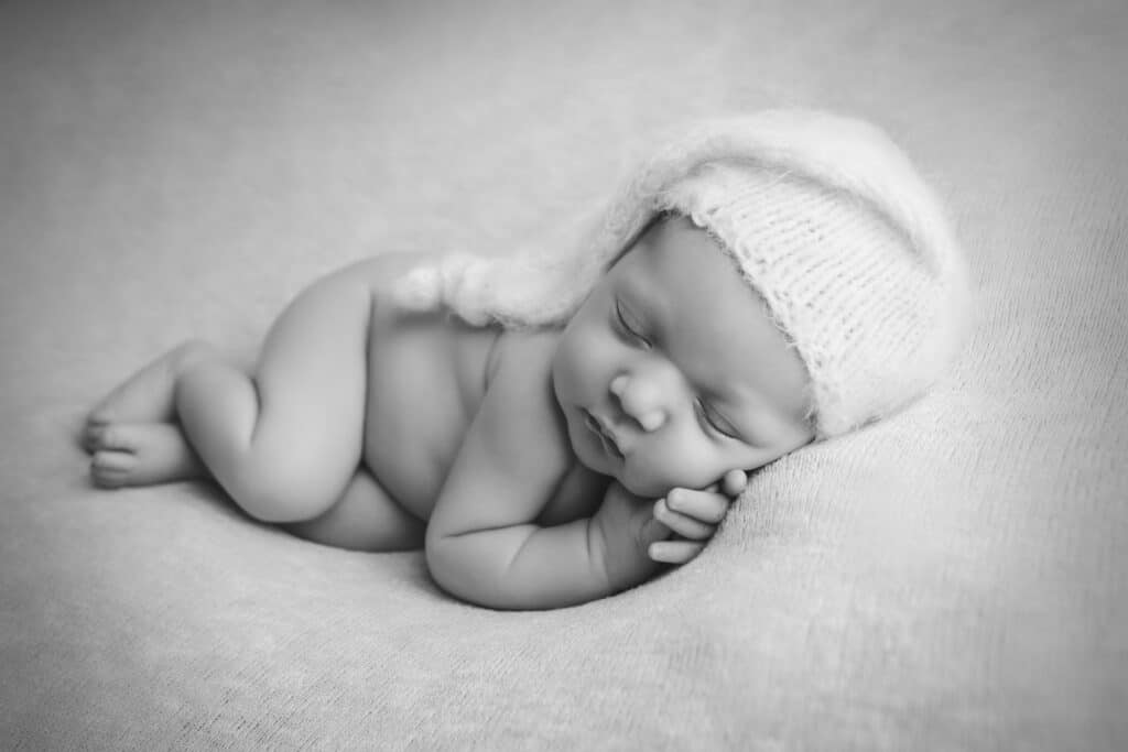 newborn photographer in rochester ny captures newborn baby boy sleeping
