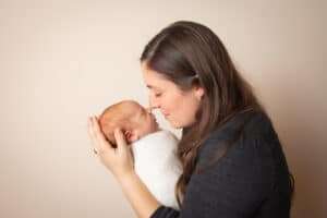 newborn photographer in rochester ny captures baby boy sleeping