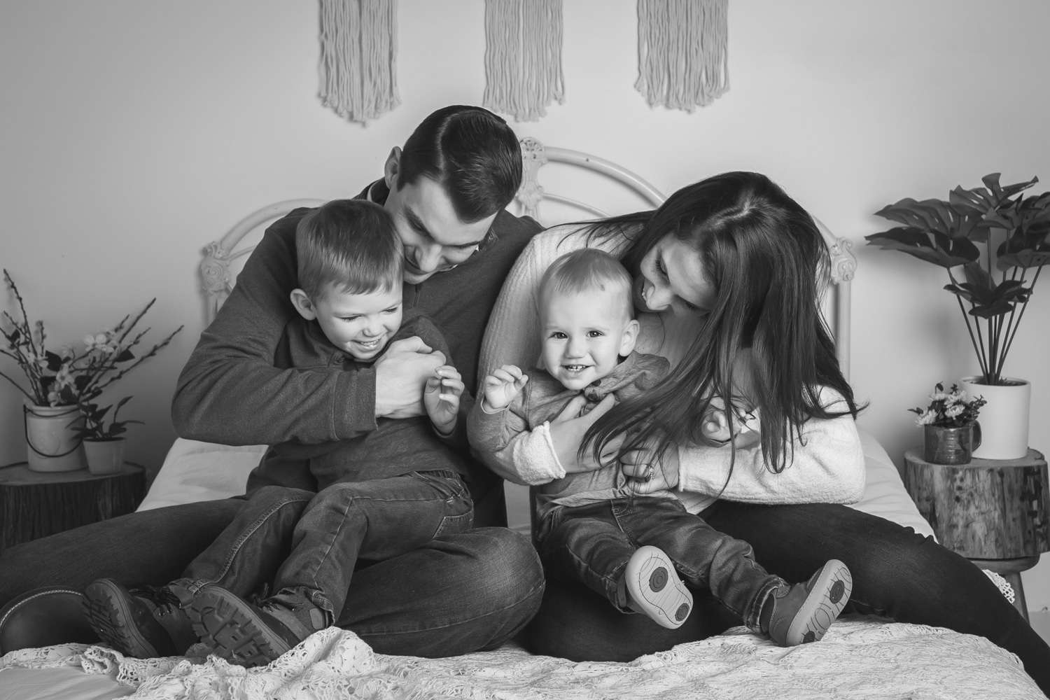 baby photographer in rochester ny captures family celebrating baby's first birthday