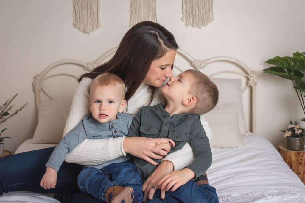 family photographer in rochester ny captures in studio casual family portraits