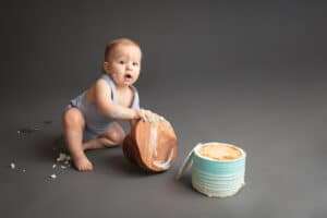 baby photographer in rochester ny captures first birthday cake smash