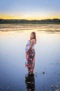 newborn photographer in rochester ny captures maternity portraits for mom-to-be in Mendon Ponds Park