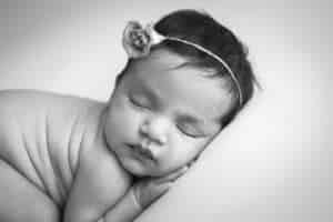 newborn photographer in rochester ny captures newborn baby girl