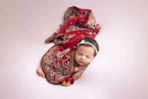 newborn photographer in rochester ny captures newborn baby girl